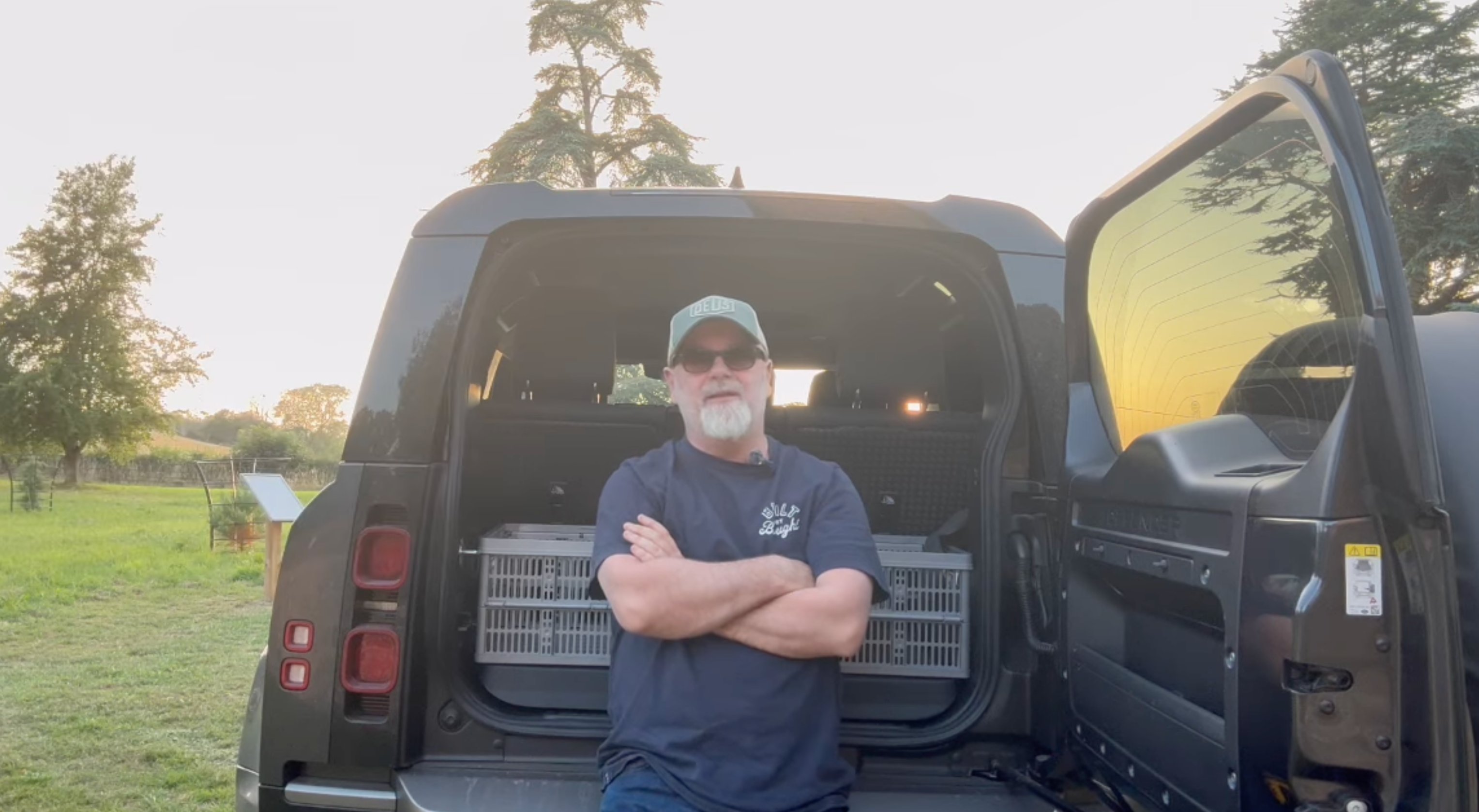 Ross at the back of his Land Rover Defender